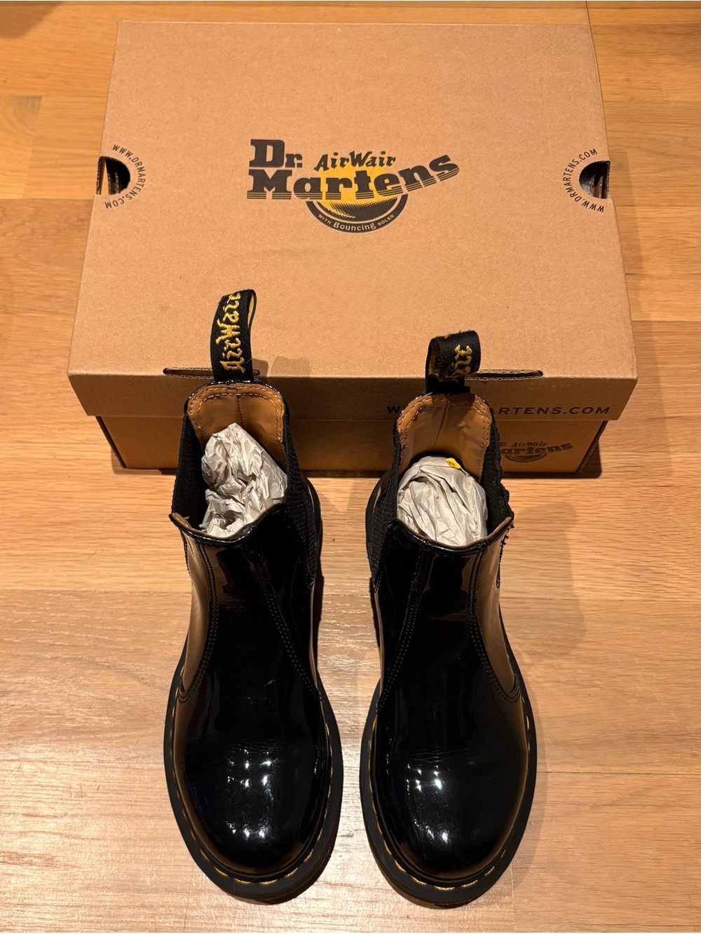 Dr. Martens Black Patent Chelsea Boots with Yellow Heel Loop